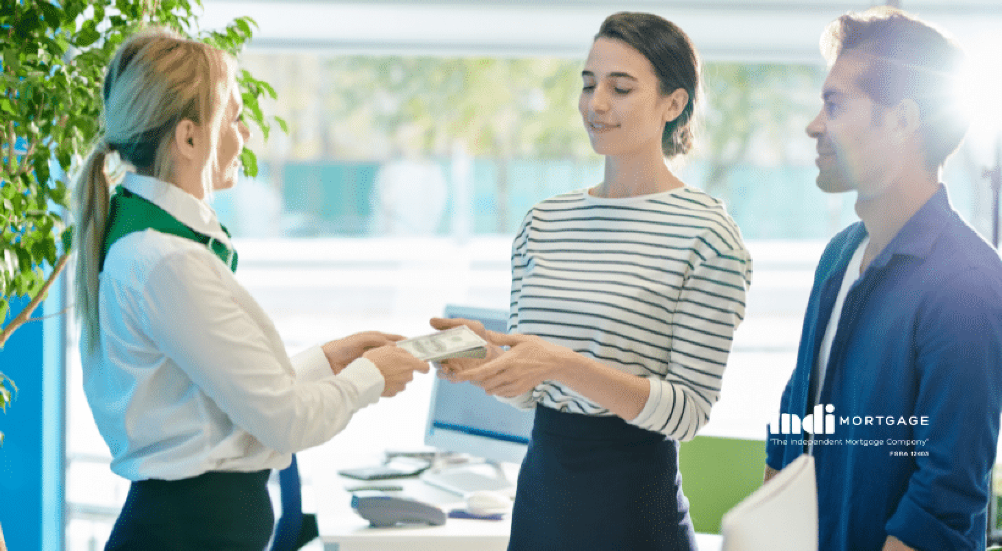 Bank specialist lending out money to couple